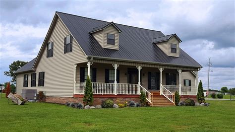 yellow house black metal roof|tin colors for homes.